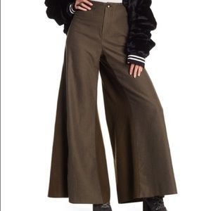 Free People Moss Colored wide legged flare pants.